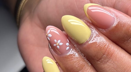 Stylish yellow and floral nail art by Polished in Berea, Kwazulu-natal, ZA, showcasing elegance and detail.