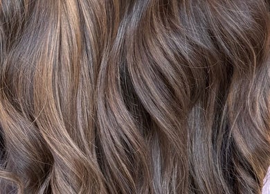 Luxurious brown hair at Bellisima The Salon, Southampton, England, GB, showcasing expert styling.