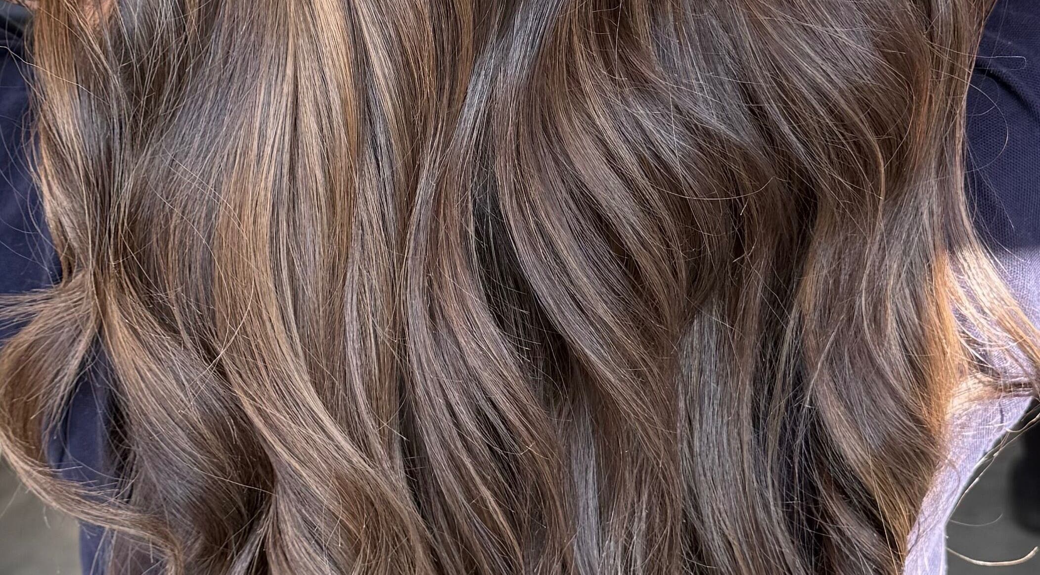 Luxurious brown hair at Bellisima The Salon, Southampton, England, GB, showcasing expert styling.