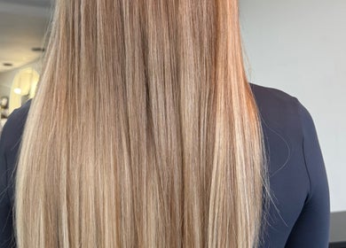 Smooth blonde hair in Bellisima The Salon, Southampton, England, GB.