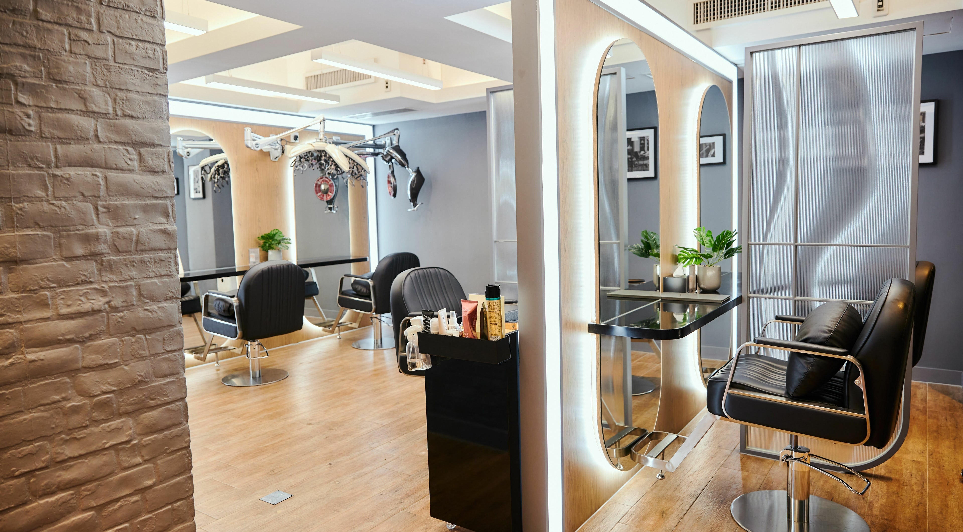 Interior of The Beau Barbershop & Hair Salon, Hong Kong Island, featuring stylish chairs and décor.