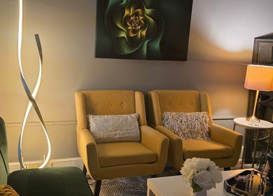 Warm, inviting lounge area at Effleurage Spa, Charles Town, West Virginia, US with modern decor.