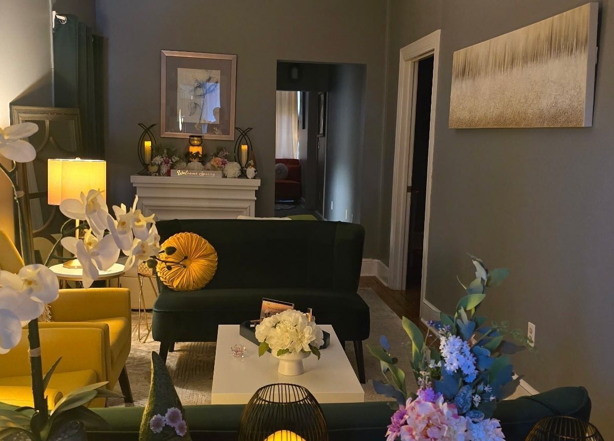 Relaxing lounge at Effleurage Spa in Charles Town, West Virginia, US, with cozy seating and elegant decor.