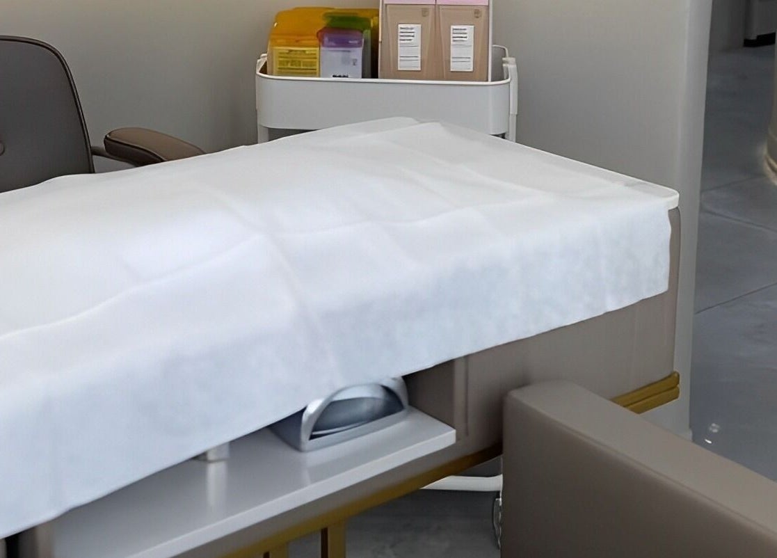 Treatment bed at Haven Spa Khalifa Branch, Abu Dhabi, AE offering a tranquil wellness experience.