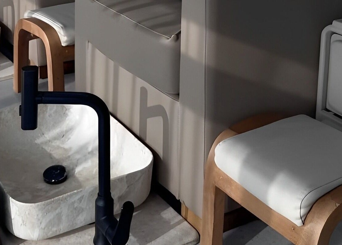 Luxurious pedicure station at Haven Spa Khalifa Branch, Abu Dhabi, Abu Dhabi, AE with modern seating and basin.