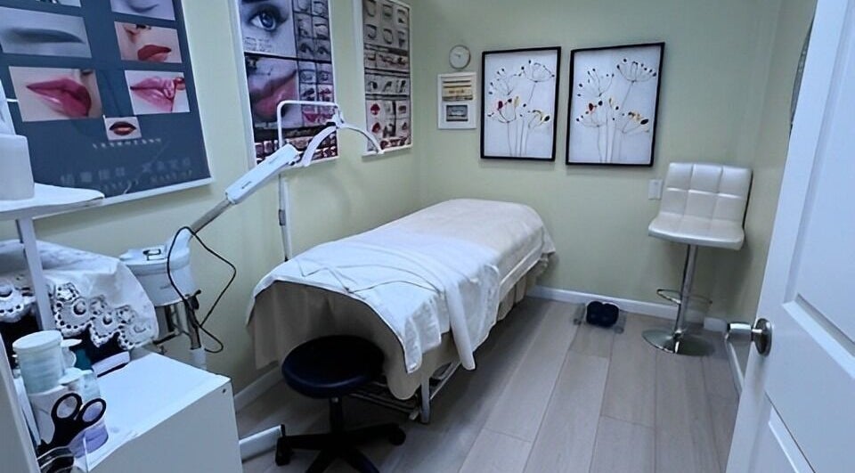 Tranquil treatment room at K2 Beauty, Daly City, California, US with a cozy bed and calming decor.