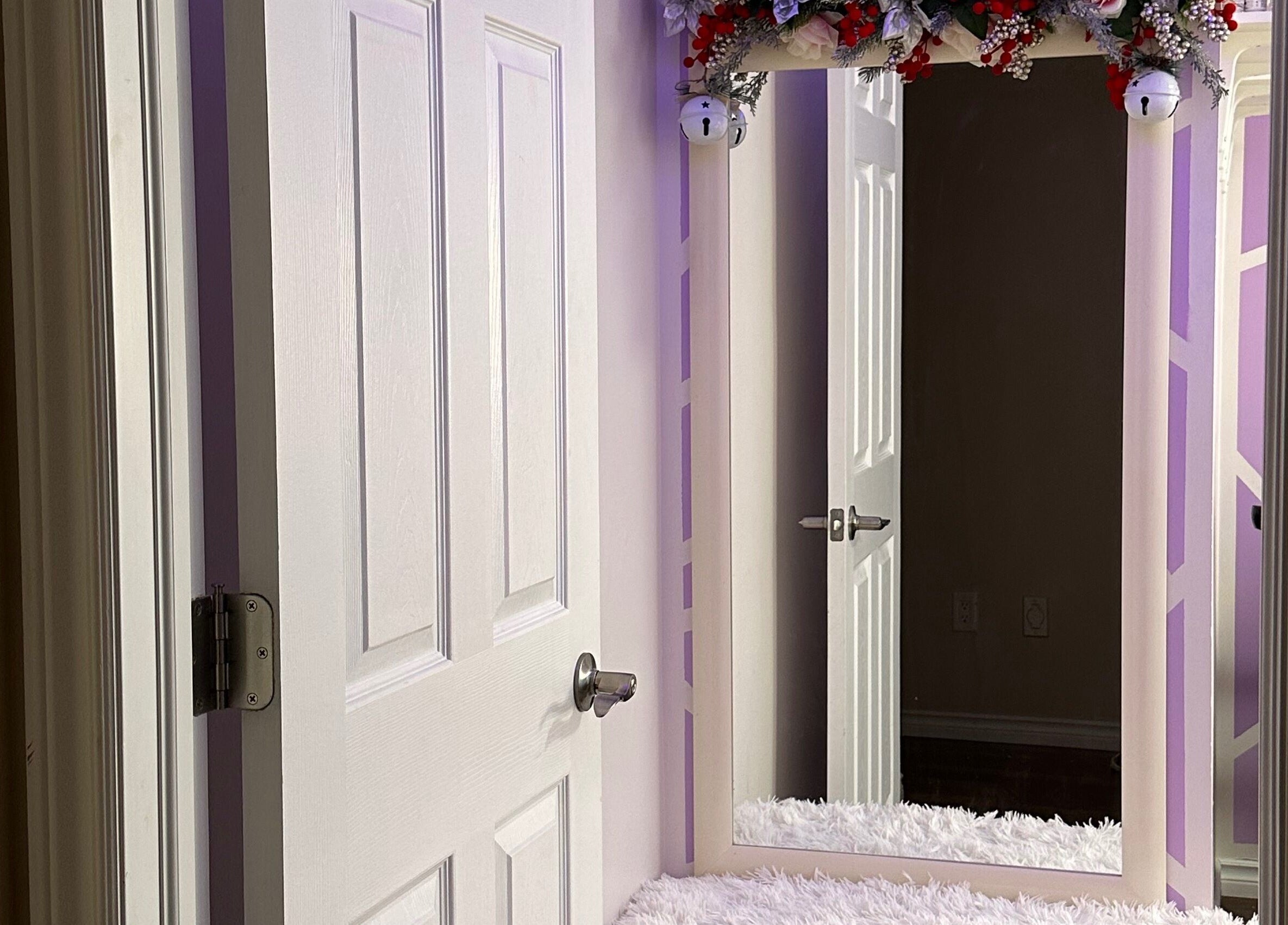 Chic hallway mirror with floral decor at Exotic Touch in Barrie, Ontario, CA, adding elegance to the venue.