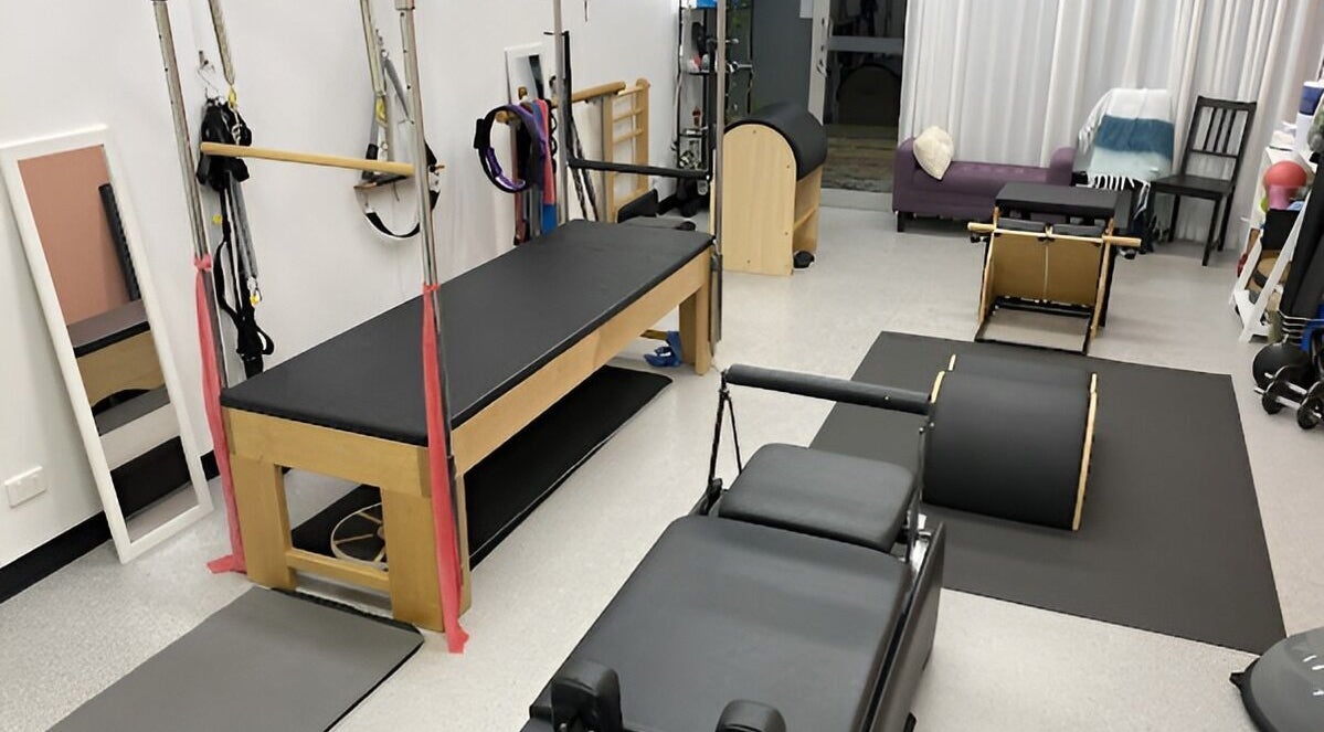 Catherine Neal Pilates studio in Mount Gravatt, Queensland, AU features modern Pilates equipment and serene decor.