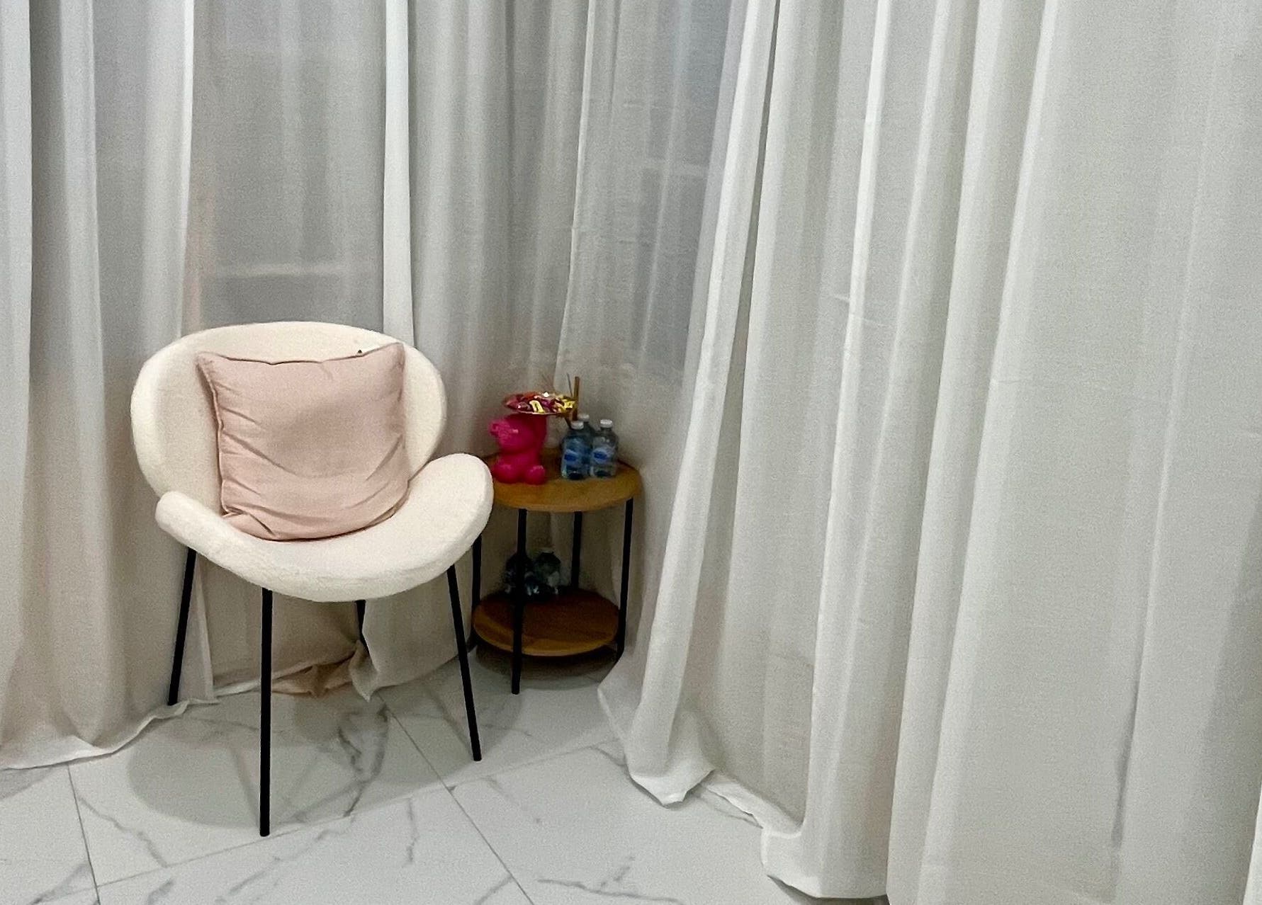 Cozy corner with a plush chair and decor at Nu Lashes, Yagoona, New South Wales, AU