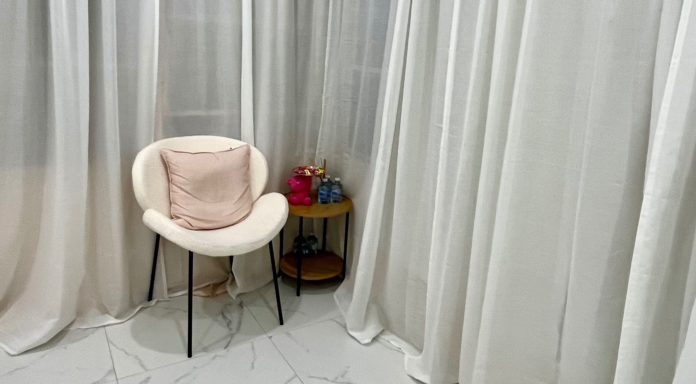 Cozy corner with a plush chair and decor at Nu Lashes, Yagoona, New South Wales, AU