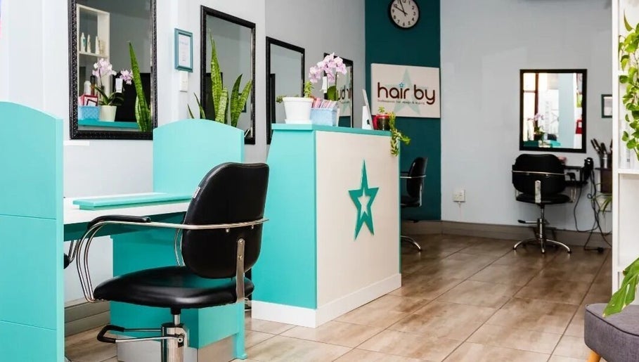 Elegant interior of Nails by Nashy salon in Cape Town, Western Cape, ZA featuring stylish workstations.