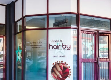 Exterior of Nails by Nashy in Cape Town, Western Cape, ZA showcasing salon signage and stylish entrance.