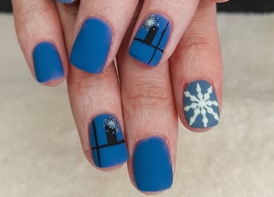 Elegant blue nails with winter design at Nails by Nashy in Cape Town, Western Cape, ZA.