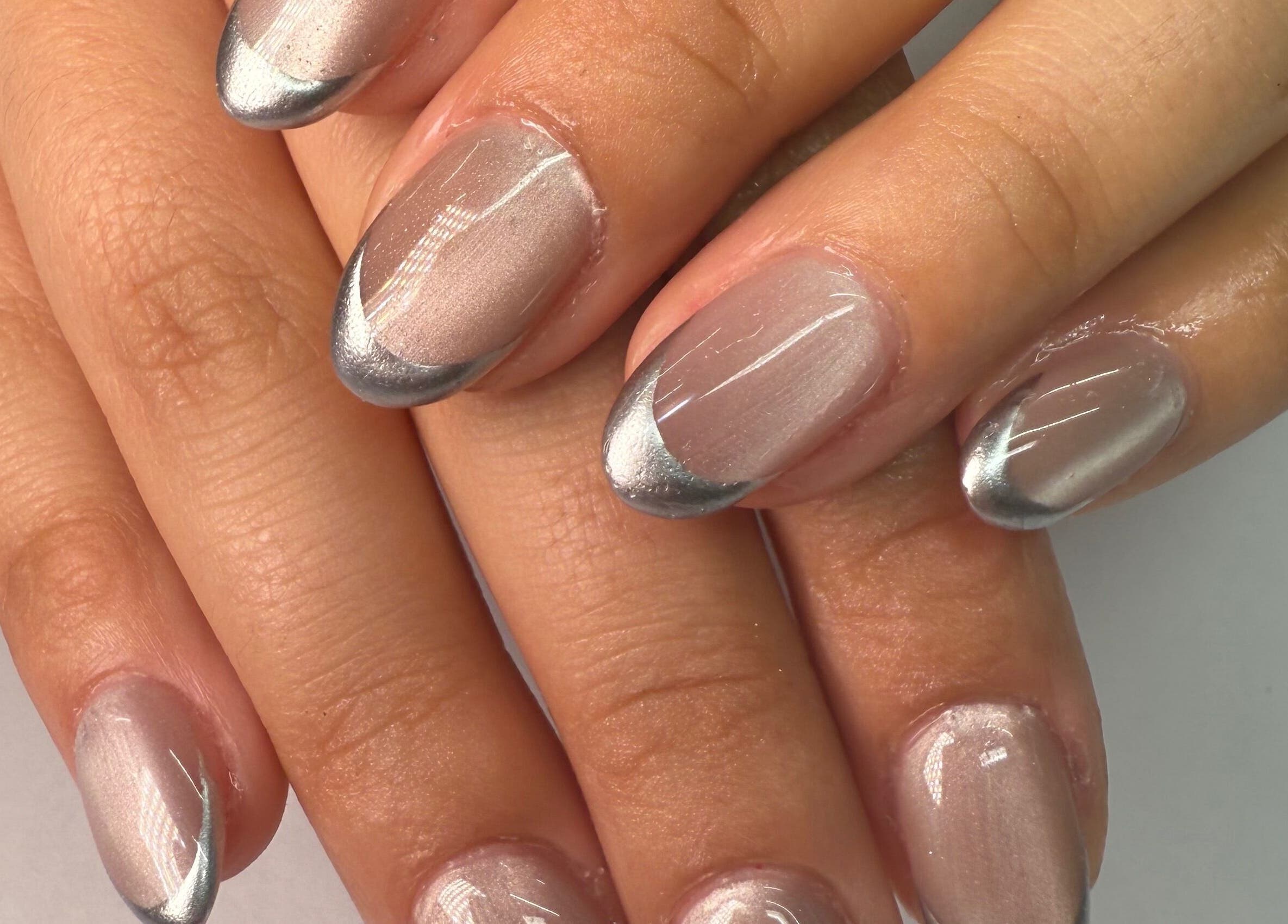 Chic silver-tipped nails at Fiu Fiu Studio in Chula Vista, California, US.