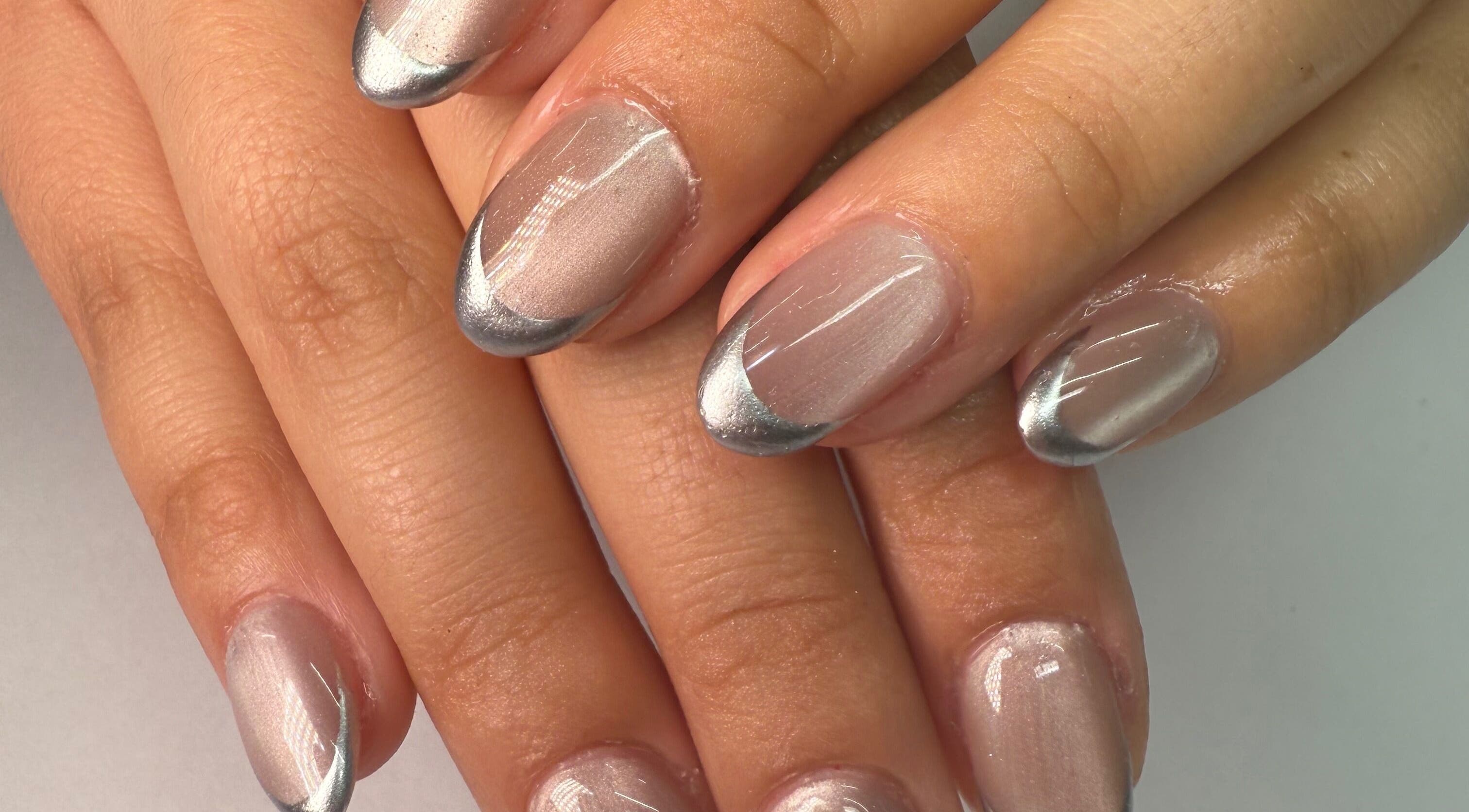 Chic silver-tipped nails at Fiu Fiu Studio in Chula Vista, California, US.