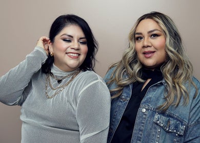 Two women smiling warmly at Fiu Fiu Studio, Chula Vista, California, US.