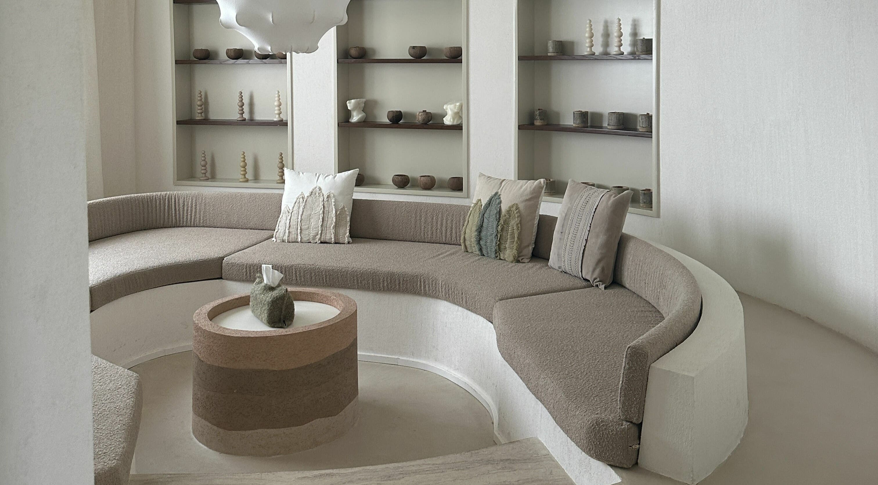 Elegant circular seating with earthy tones at Another Mars, Dubai, Dubai, AE radiates serenity and warmth.
