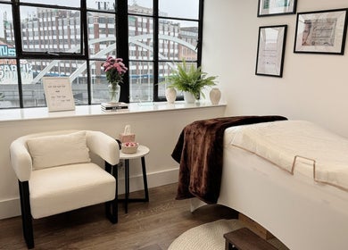 Cozy interior of Sprinkle Of Magic Lashes - Shoreditch in London, England, GB featuring a stylish treatment area.