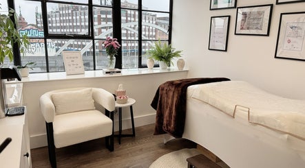 Cozy interior of Sprinkle Of Magic Lashes - Shoreditch in London, England, GB featuring a stylish treatment area.