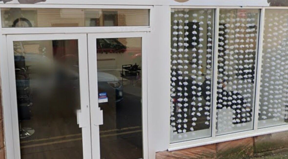 Front view of Beauty by Ally, showcasing modern glass doors in Hamilton, Scotland, GB.