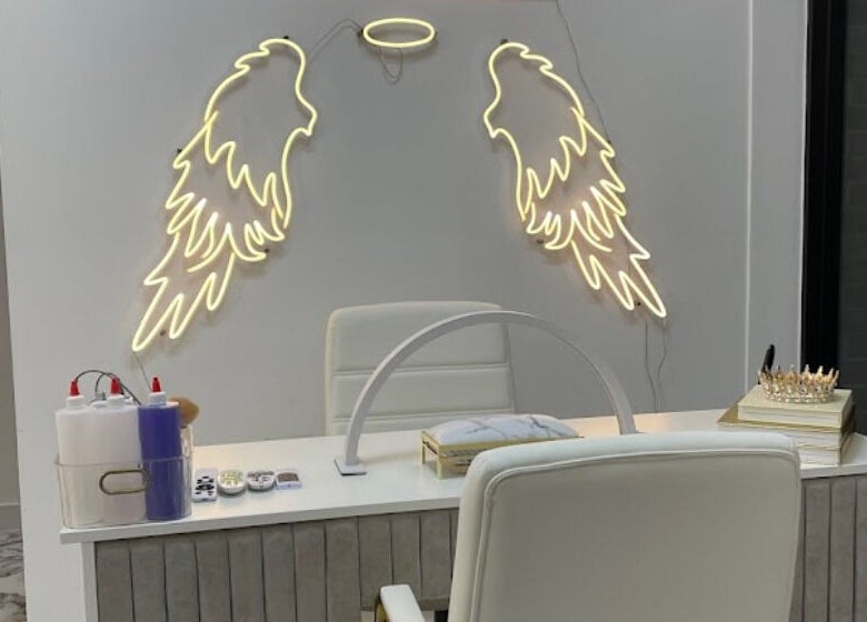 Modern nail station with angel wing lights at House of Nailz™ in Dunstable, England, GB.
