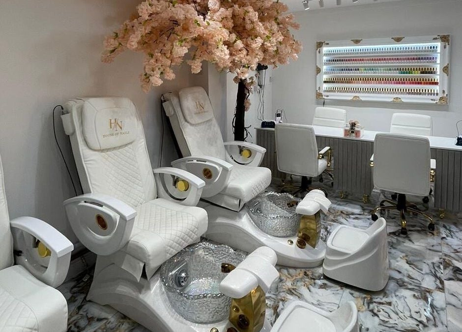 Luxurious pedicure chairs at House of Nailz™, Dunstable, England, GB, showcasing a tranquil nail spa setting.