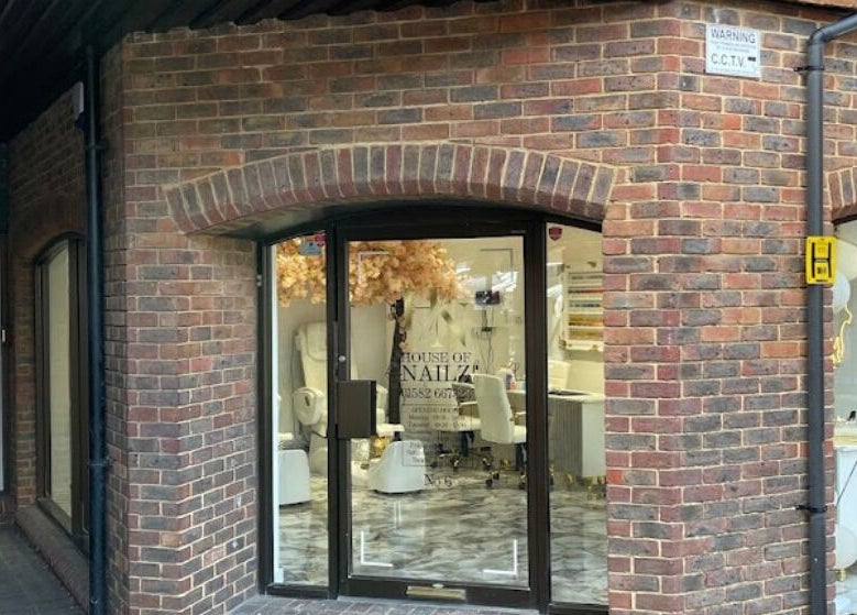 Exterior view of House of Nailz™ salon in Dunstable, England, GB showcasing elegant design.