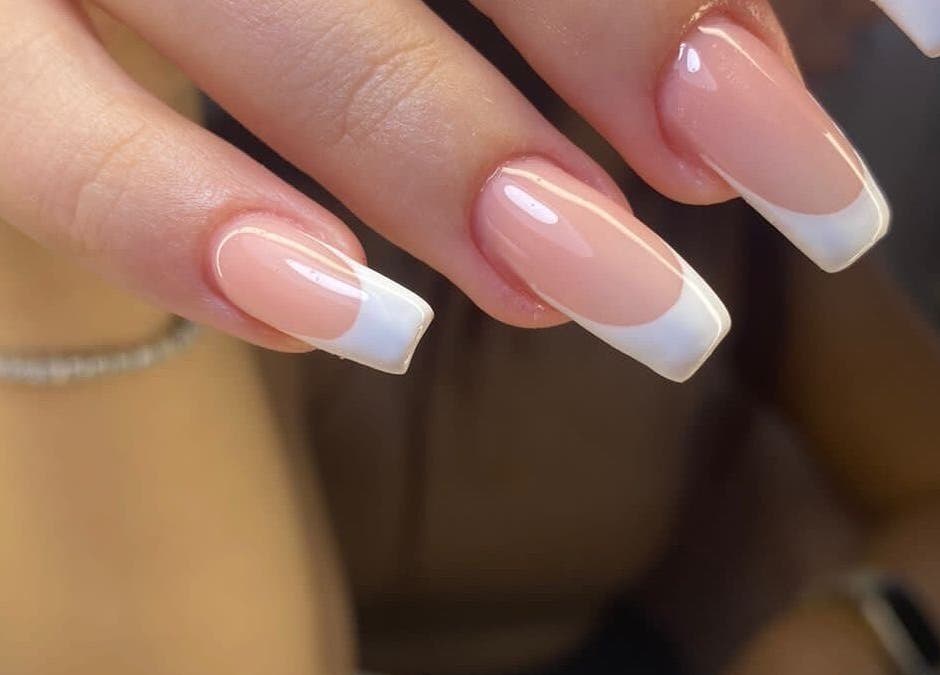 French manicure at Karen’s Beauty in Hadath, Mount Lebanon Governorate, LB showcasing elegant nail design.
