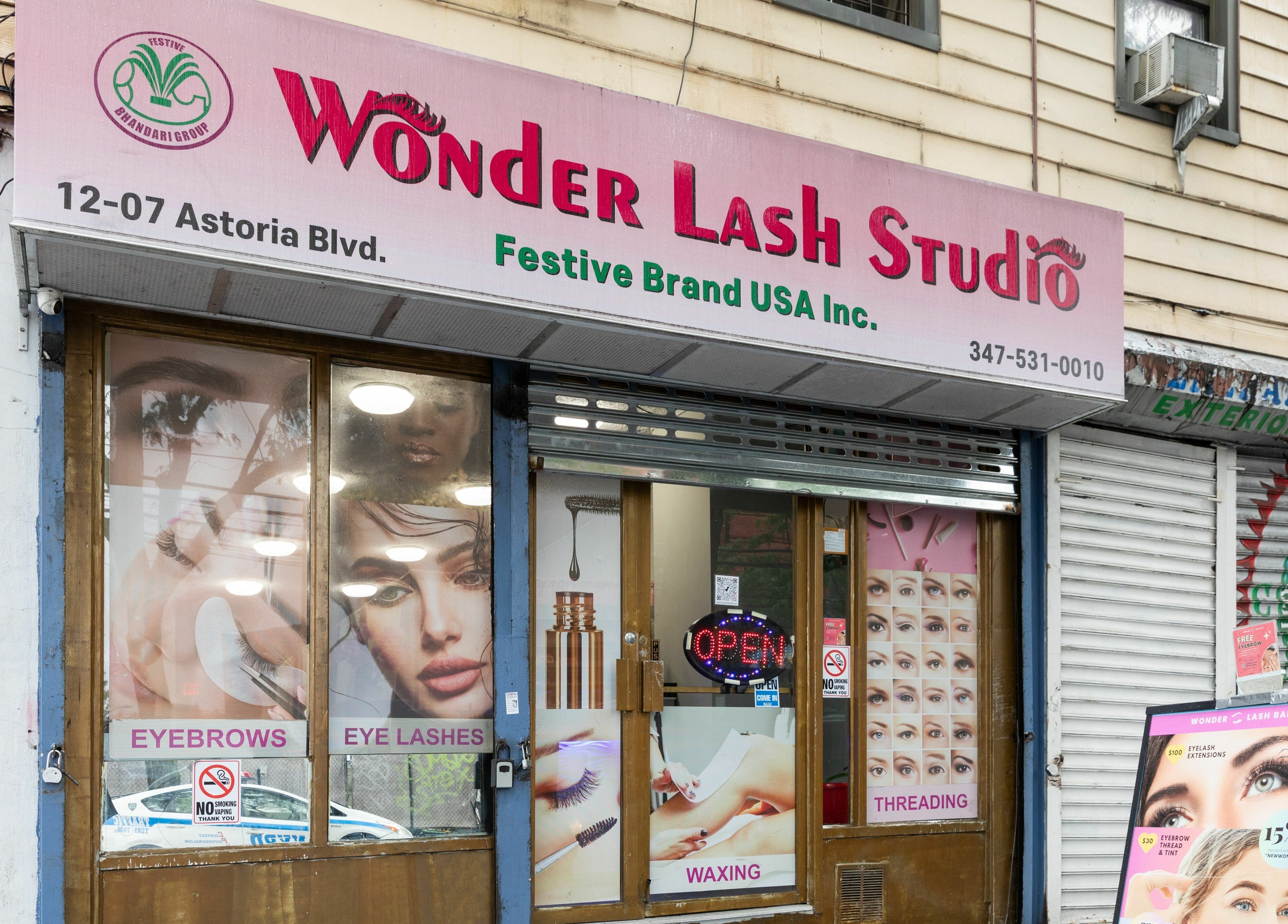 Front of Wonder Lash Studio Queens in Long Island City, US showcasing beauty services and vibrant signage.