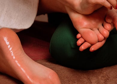 Relaxing foot massage at Boon Massage & Healing in Arlington, Massachusetts, US, offering holistic wellness.