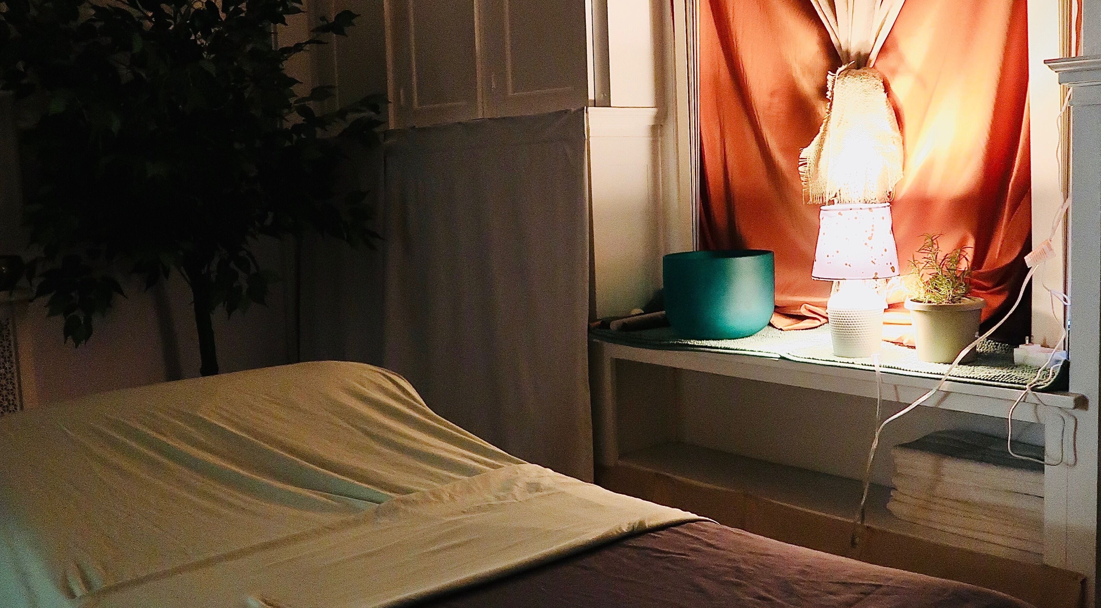 Relaxing massage room at Boon Massage & Healing, Arlington, Massachusetts, US, featuring a cozy ambiance.