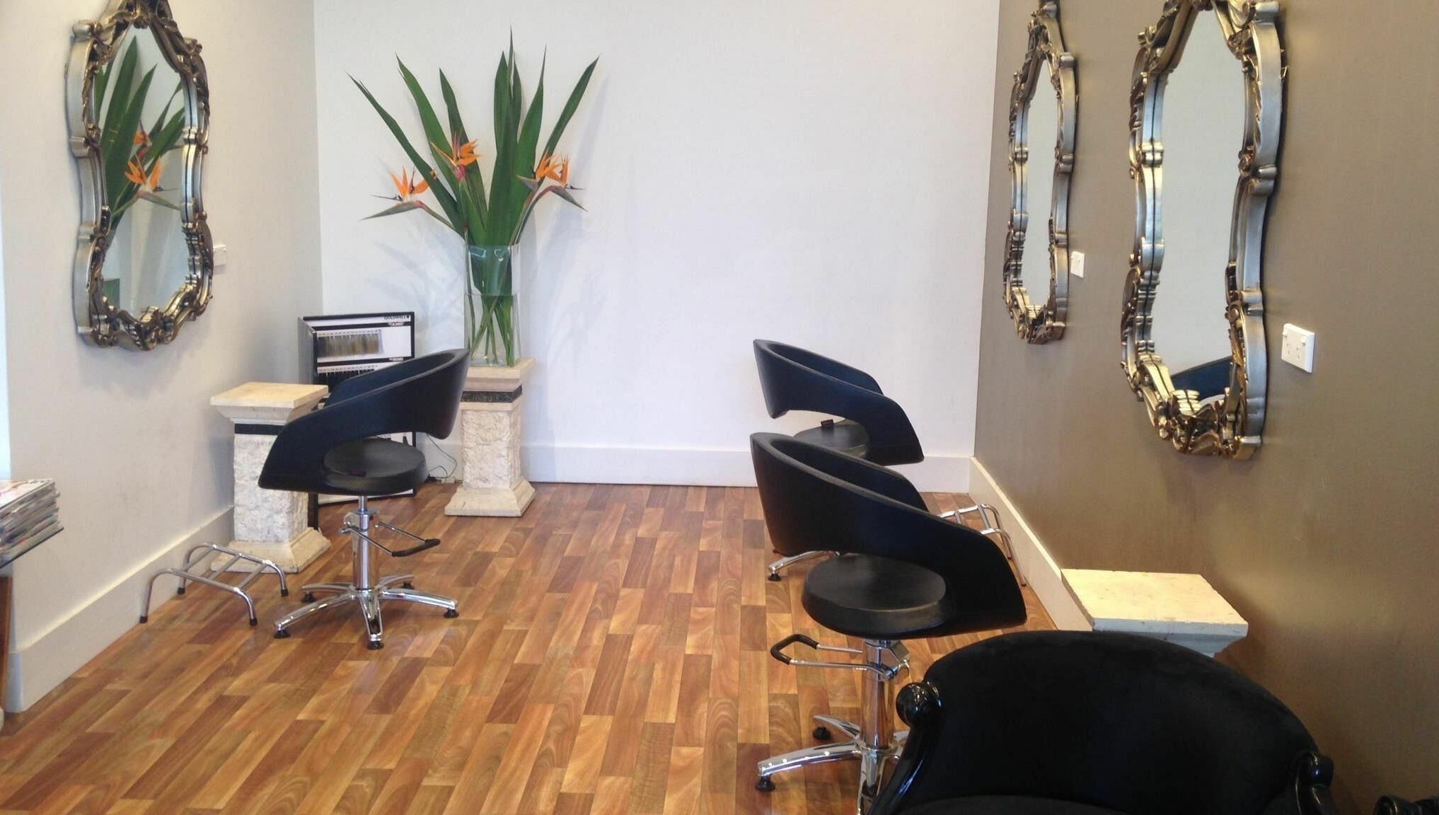 Luxurious salon chairs and mirrors at Absolute Hair Design, Edgecliff, New South Wales, AU.