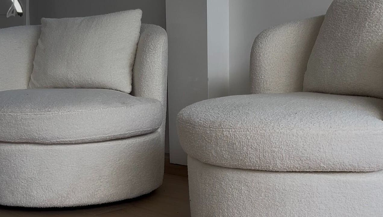 Plush white chairs at Onlylashessx, Green Valley, New South Wales, AU, exude comfort and style in modern decor.