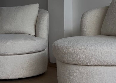 Plush white chairs at Onlylashessx, Green Valley, New South Wales, AU, exude comfort and style in modern decor.
