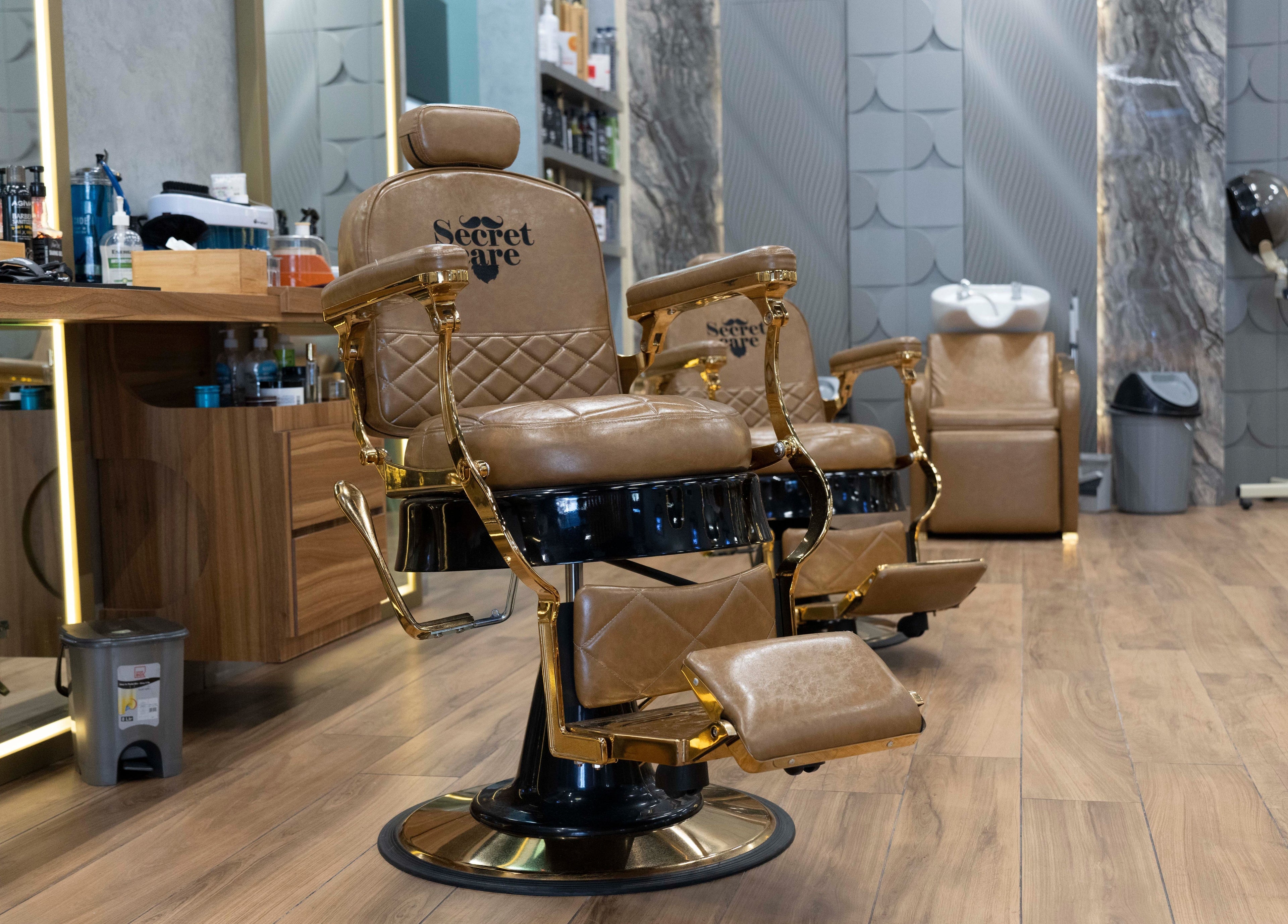 Luxurious barber chairs at Secret Care Barber Shop, Sharjah, Sharjah, AE, offering premium grooming services.