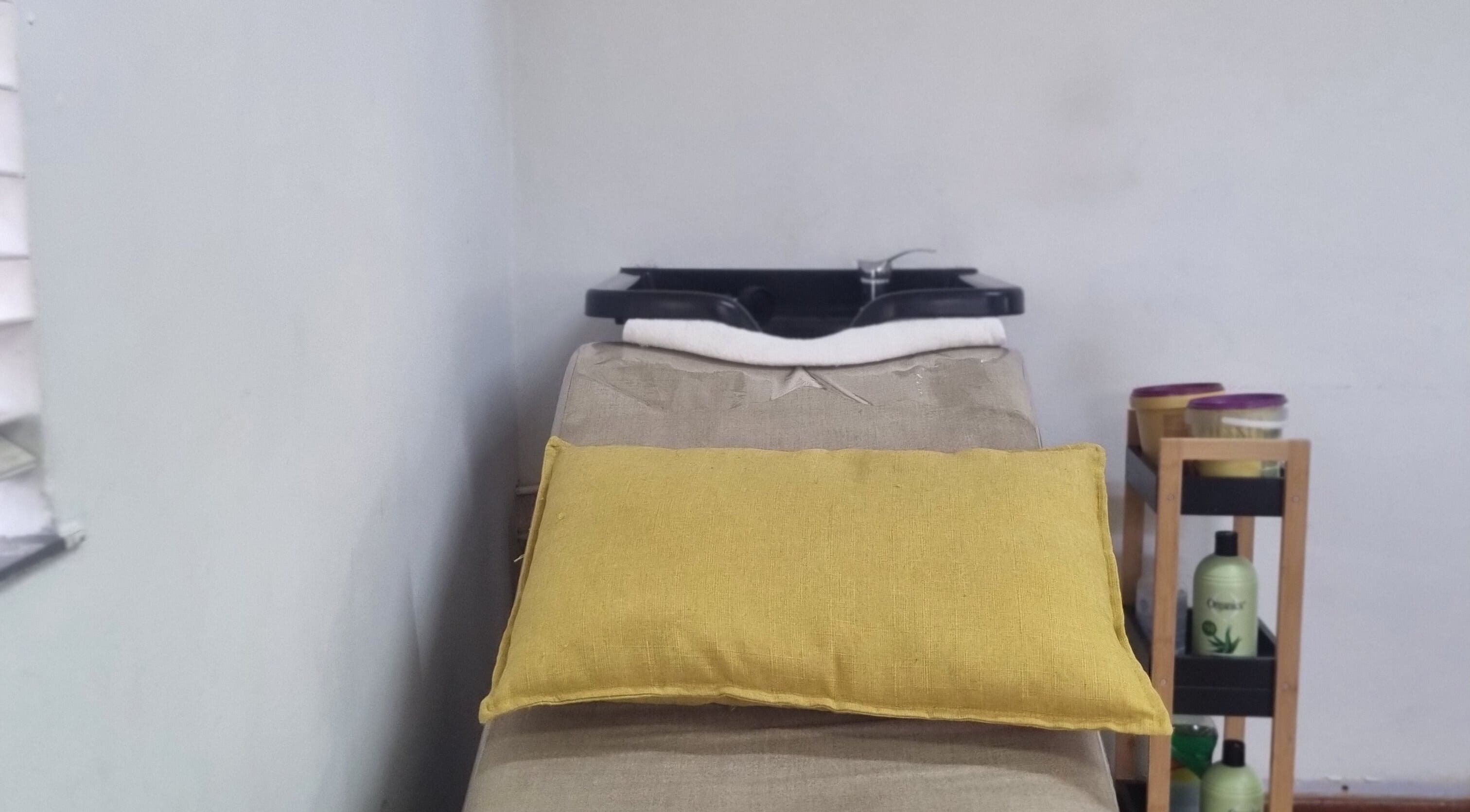 Relaxing wash station at Enhle Afro Salon, Mthatha, Eastern Cape, ZA. Dreamy spa ambiance for hair treatments.