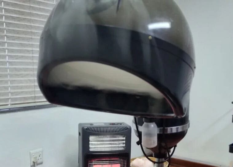 Professional salon hair dryer at Enhle Afro Salon, Mthatha, Eastern Cape, ZA, perfect for styling needs.