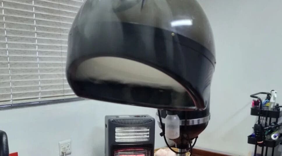 Professional salon hair dryer at Enhle Afro Salon, Mthatha, Eastern Cape, ZA, perfect for styling needs.