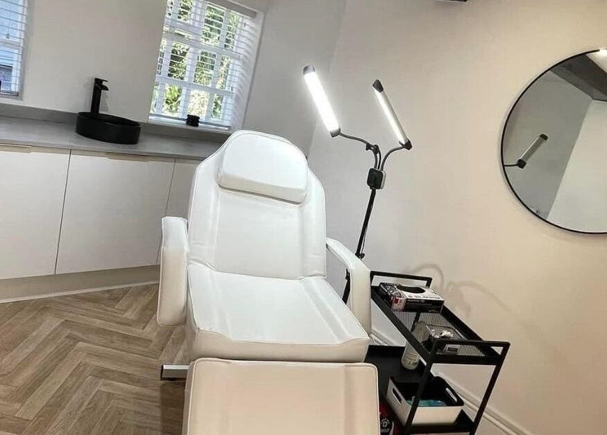 Luxurious treatment room with a white chair at By Bex and Co, Selby, England, GB.