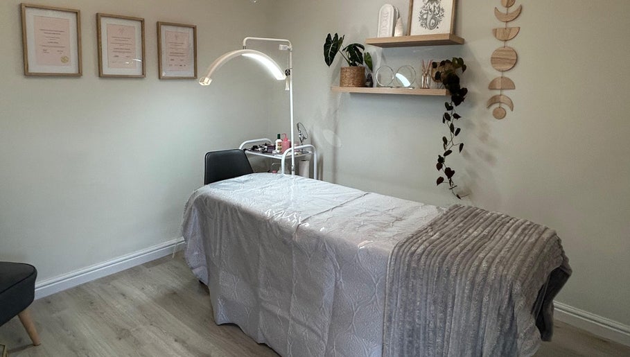 Relaxing therapy room at New Moon Brow Artistry in Randburg, Gauteng, ZA, featuring a cozy treatment bed.