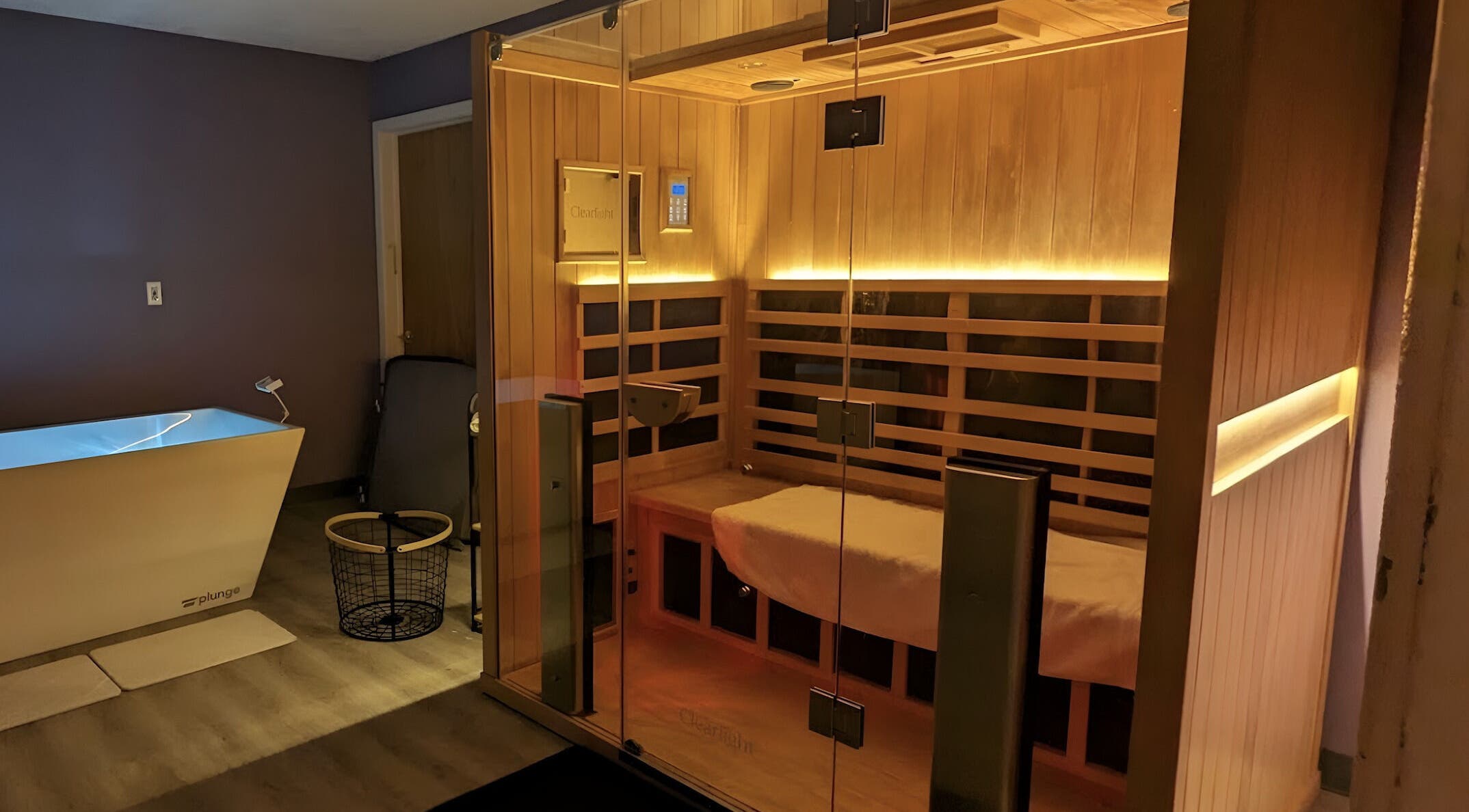 Luxurious sauna and modern tub at Mood Swing Wellness in Milwaukee, Wisconsin, US, offering a tranquil experience.