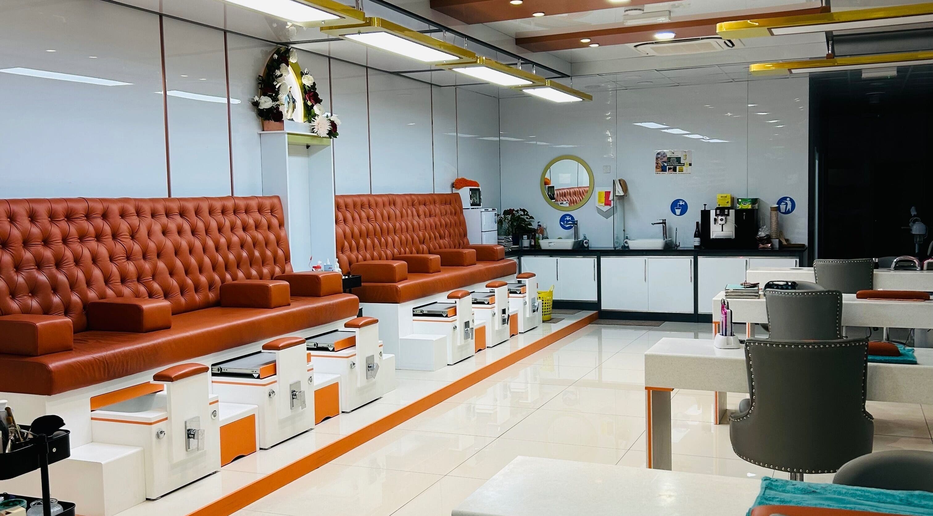 Luxurious pedicure chairs at Silk and Glow Skincare in London, England, GB with stylish decor.