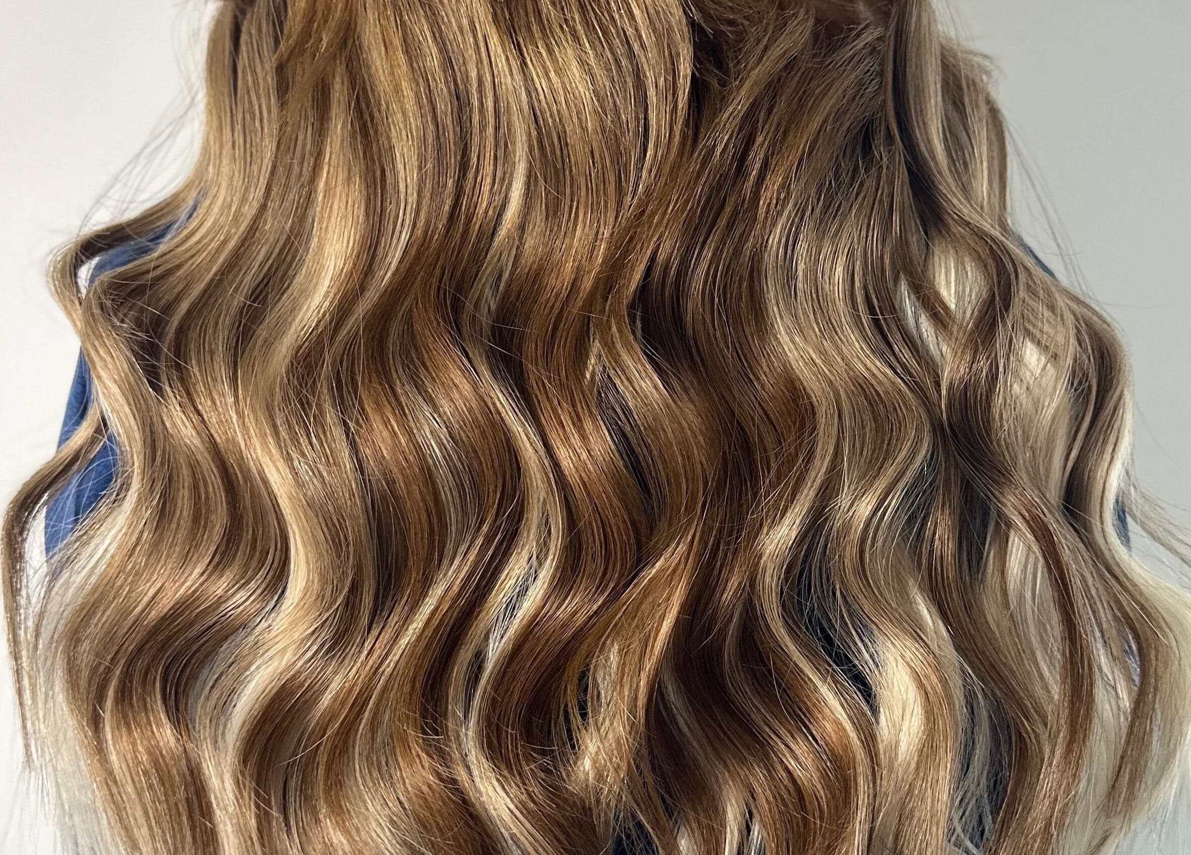 Silky, golden-brown waves styled perfectly at Lmc Hair, Alloa, Scotland, GB.