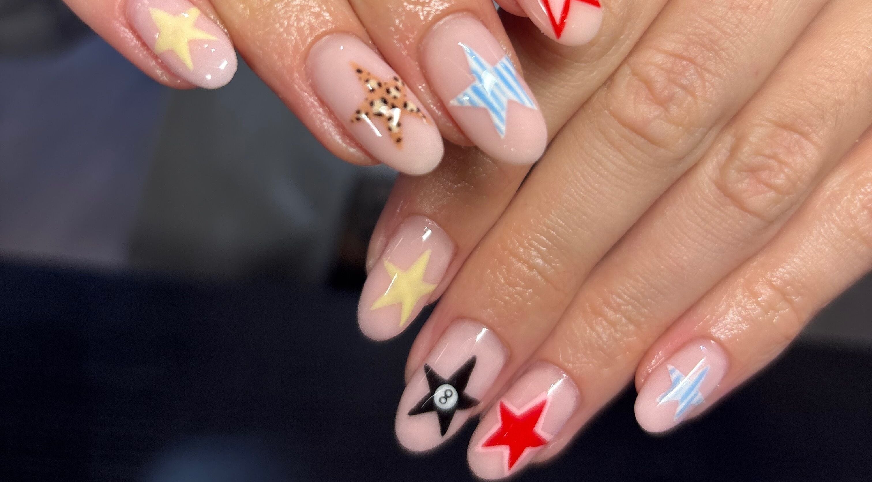 Star-patterned nail art at Blended Beauty Rugeley, Rugeley, England, GB.