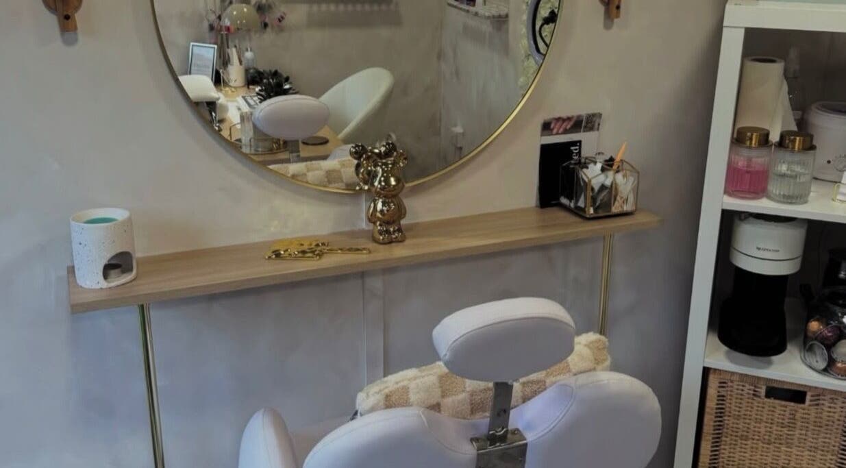 Elegant salon setup at Beauty by CO B, Dronfield, England, GB with a stylish chair and mirror.