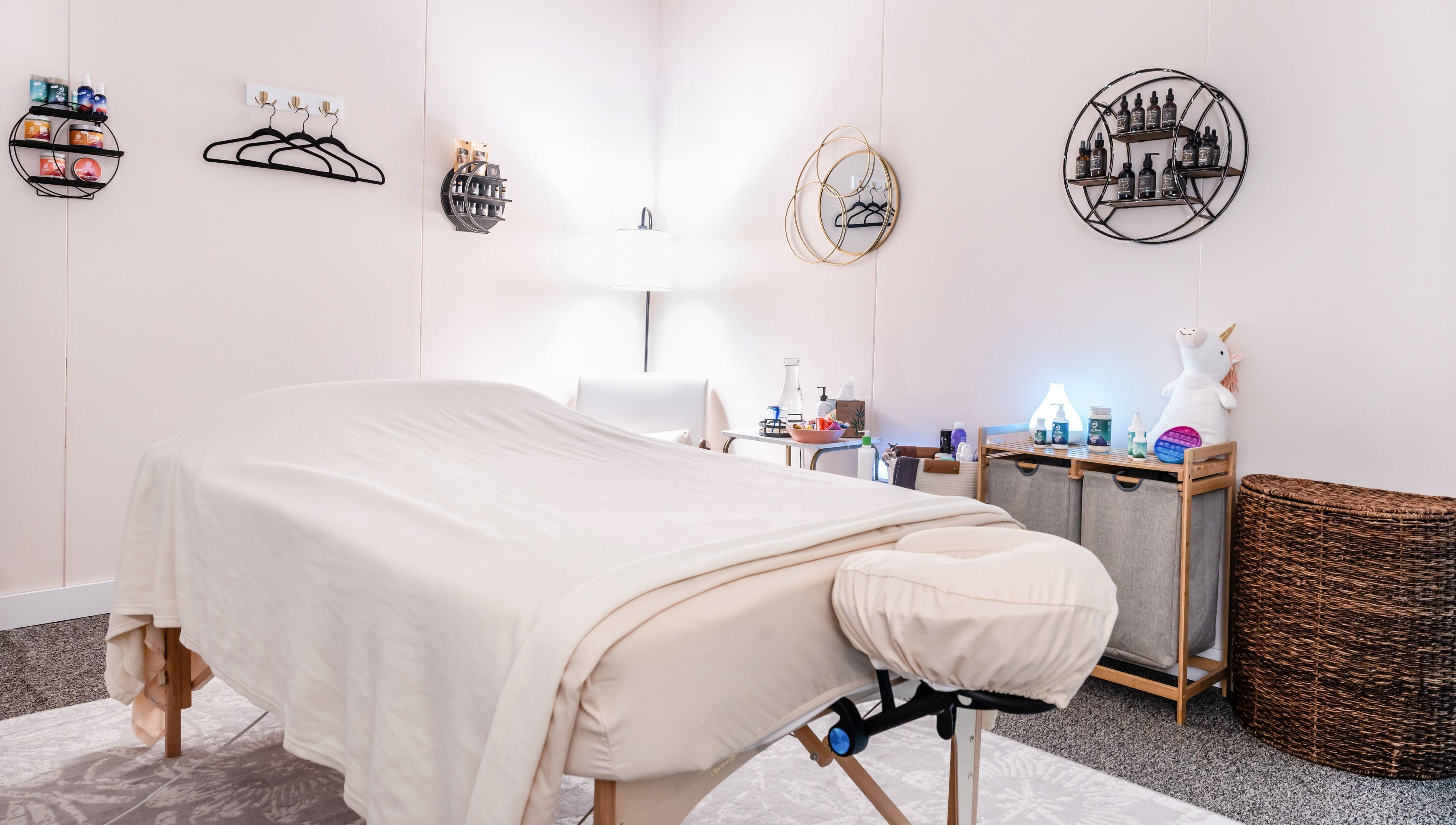 Relaxing massage room at Open Your Heart in Saline, Michigan, US with cozy decor and tranquil ambiance.