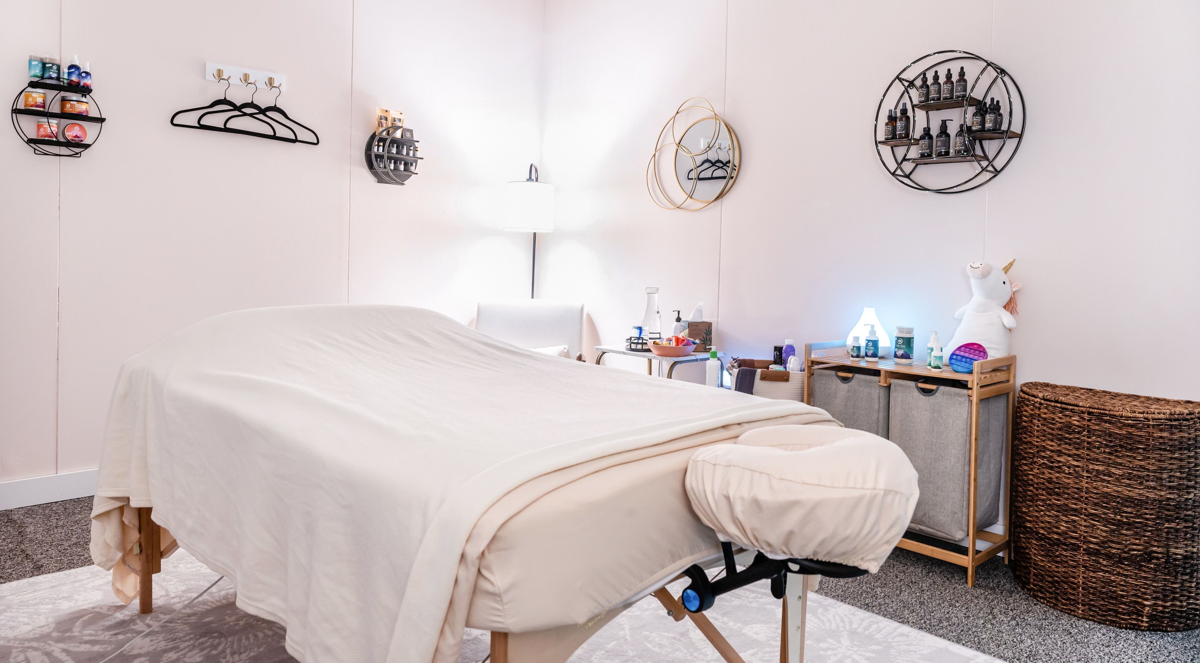 Relaxing massage room at Open Your Heart in Saline, Michigan, US with cozy decor and tranquil ambiance.