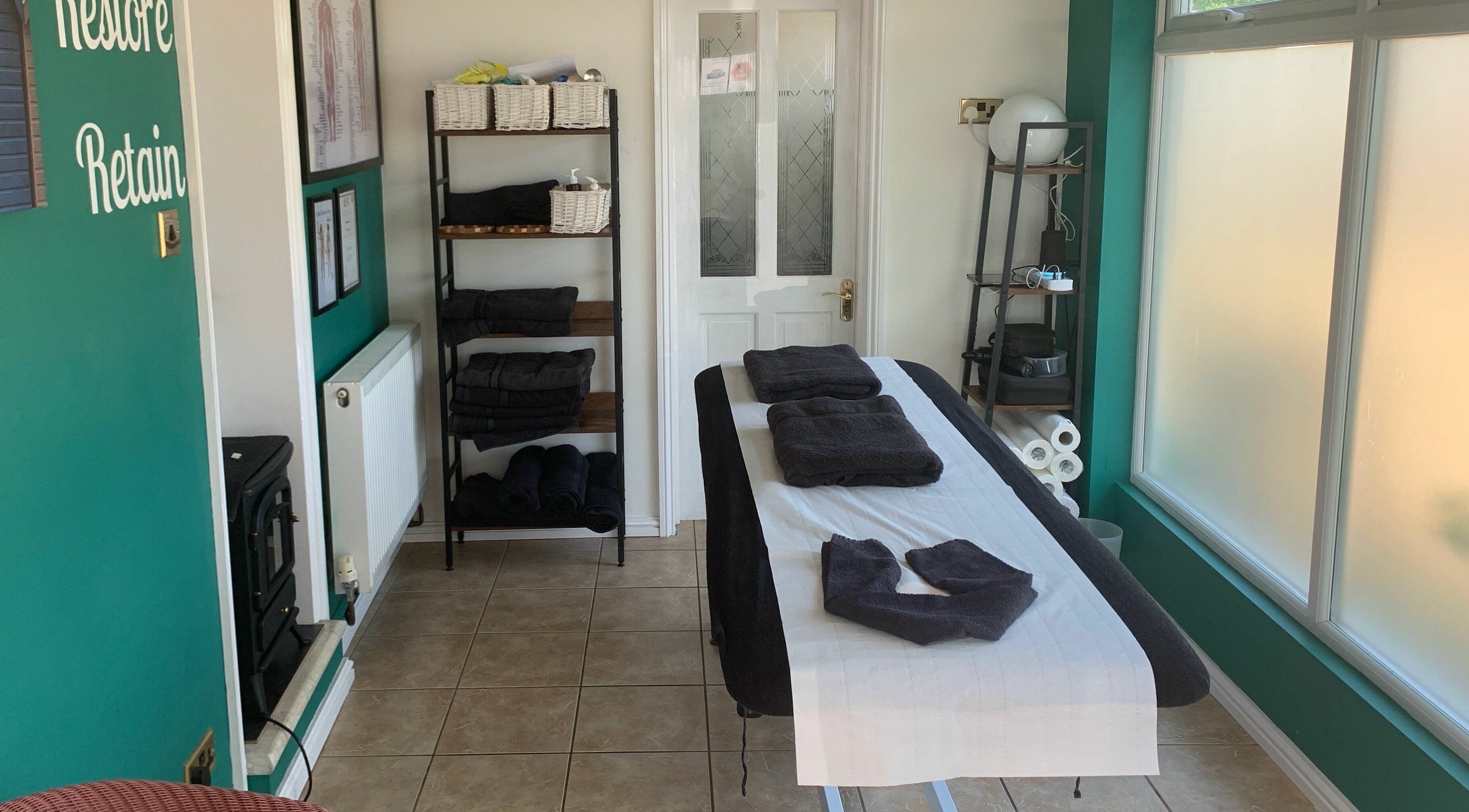 Calming massage room at Spalding Massage Therapy, Spalding, England, GB, featuring a neatly arranged massage table.