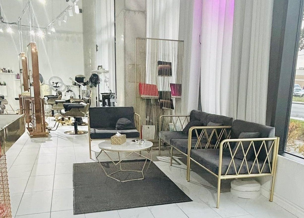 Stylish interior of SK Hair Salon in Montréal, Québec, CA featuring chic seating and decor.