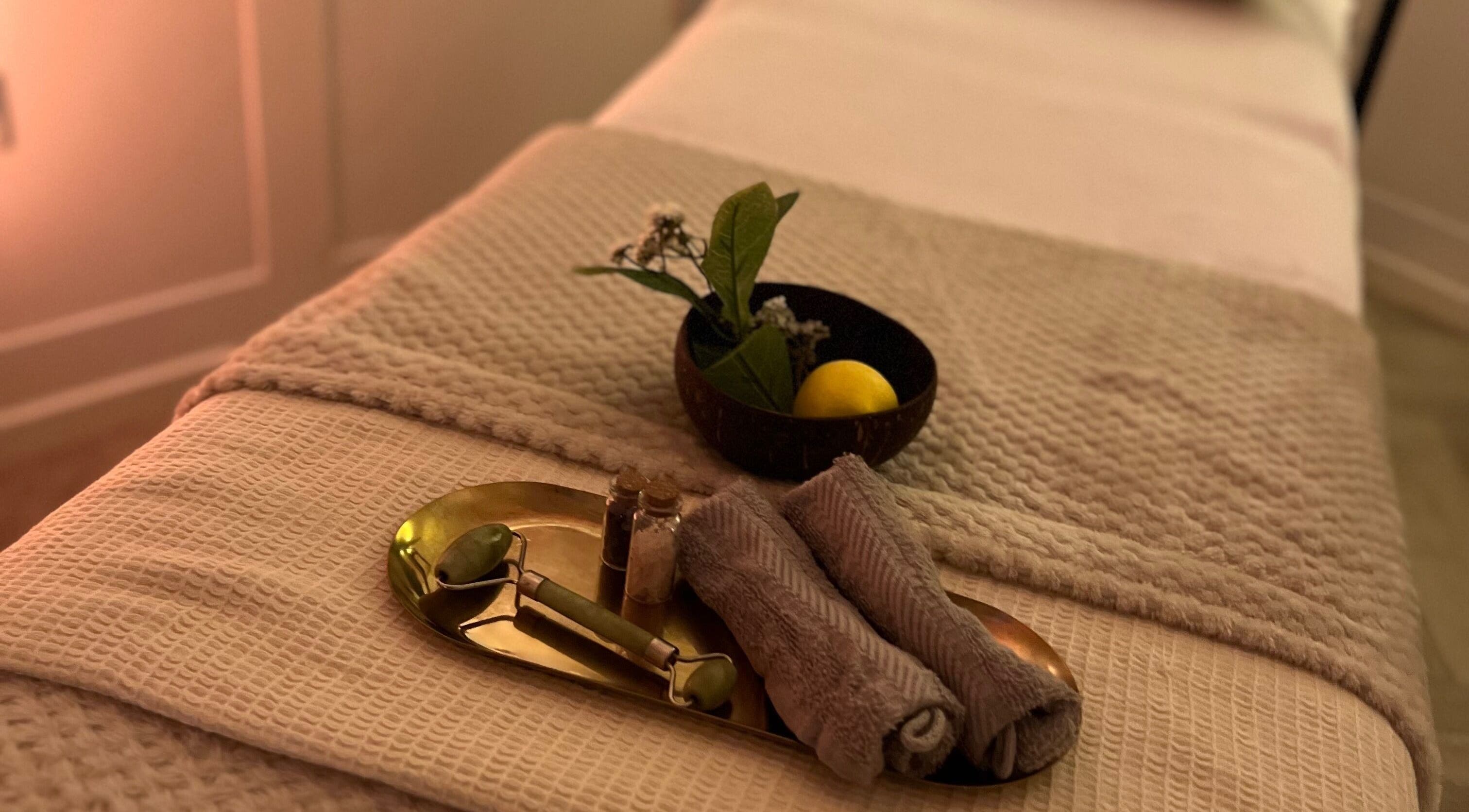 Calming therapy table at Acupuncture with Natalie, Lowestoft, England, GB, with jade roller and towels.